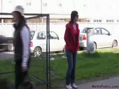 Russian amateur wife walks down the sidewalk and pees in her jeans 